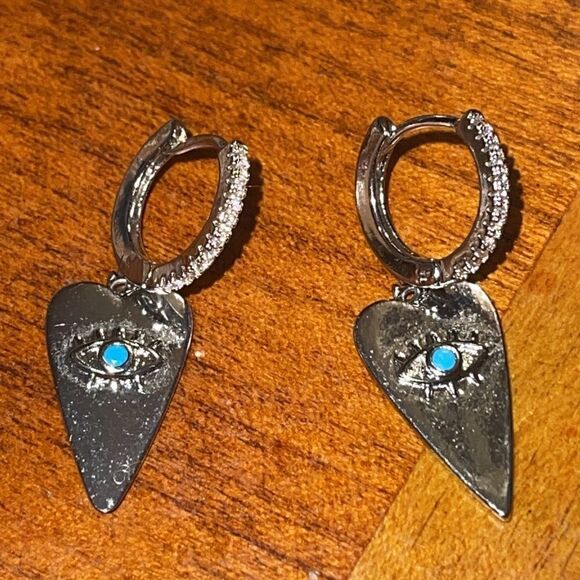 Silver tone heart shaped dangle earrings with evil eye - Picture 1 of 4